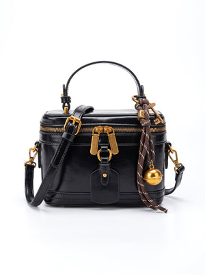 Bolso cruzado rígido