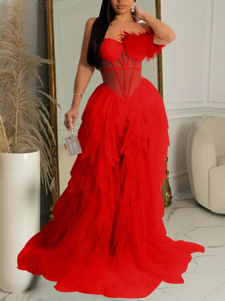Vestido largo Celeste con corsé y plumas